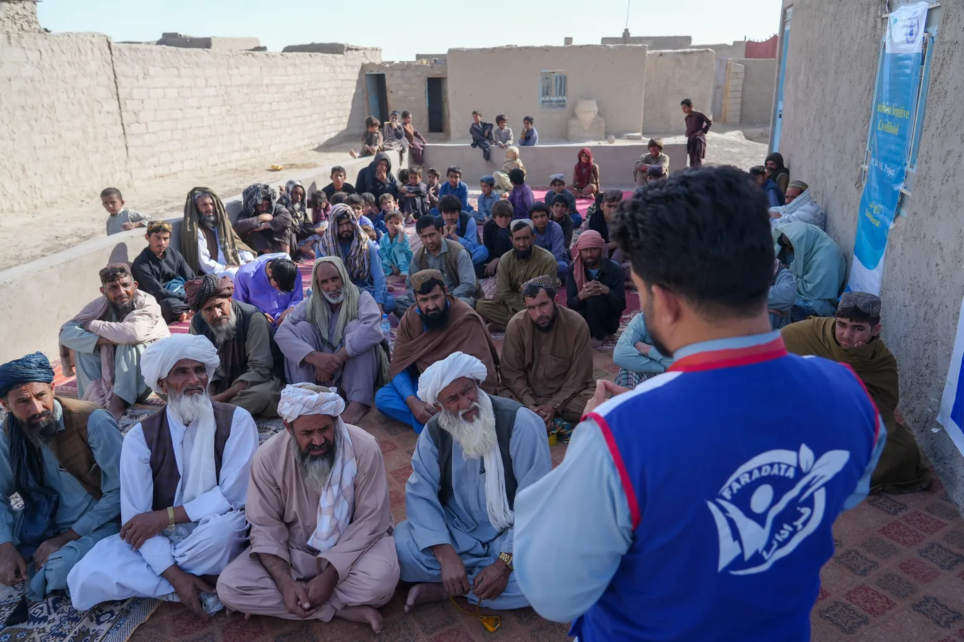 Community members gather for a training led by FSCWEO staff