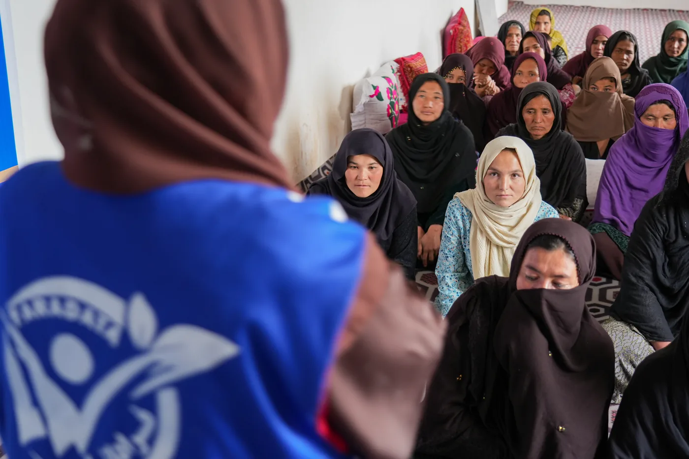 An FSCWEO facilitator leads an awareness session for women in Daikundi